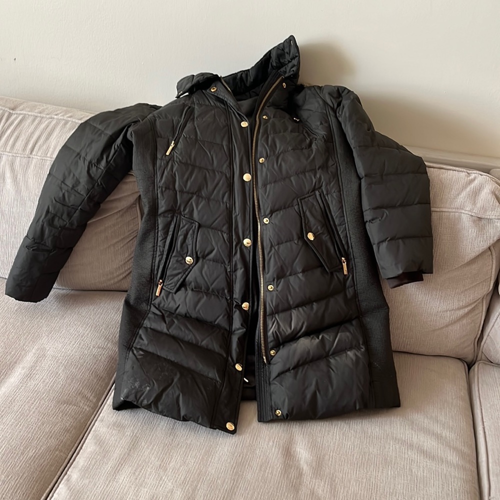 Army green jacket some stains at bottom photo shown able to be cleaned